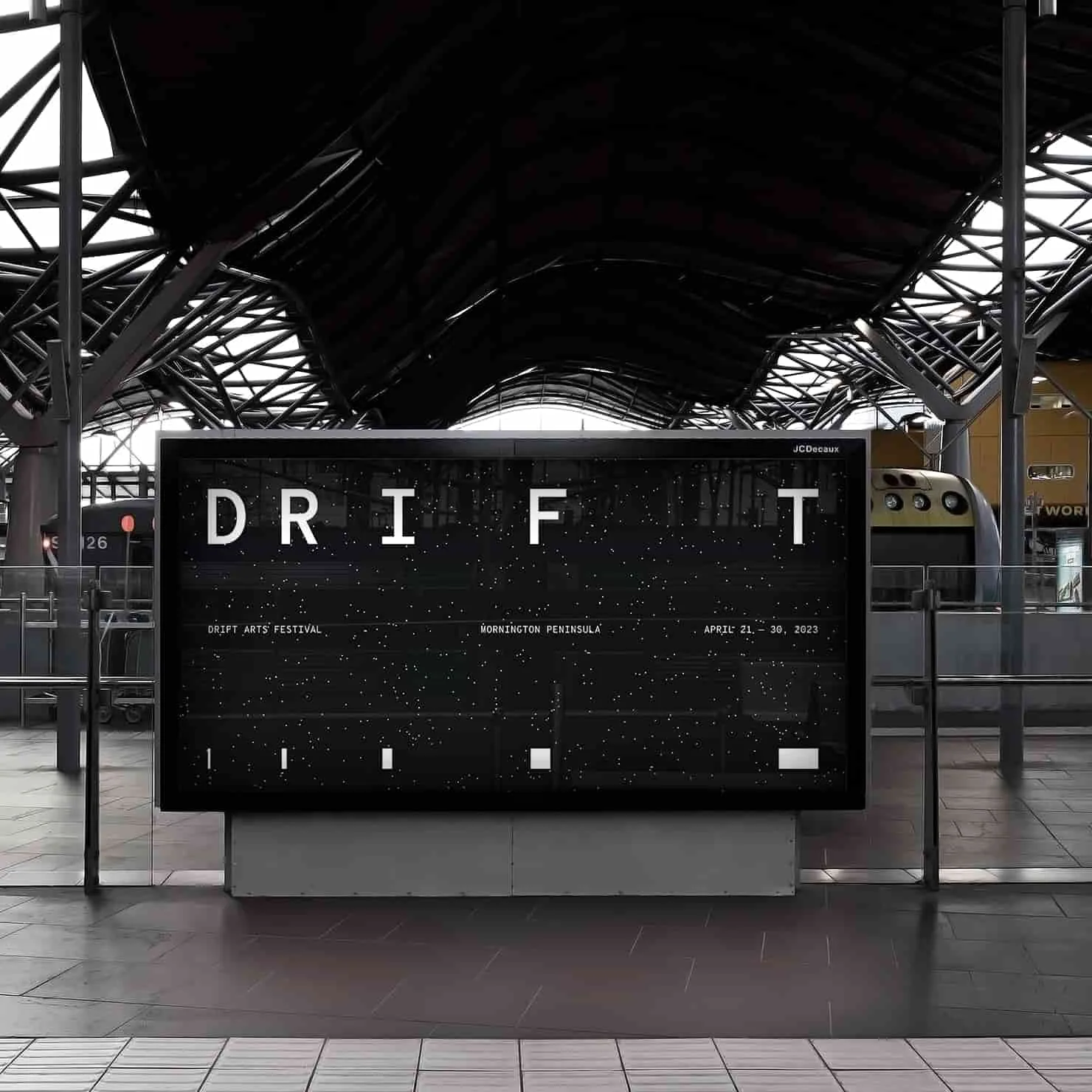 DRIFT festival screen at a train station